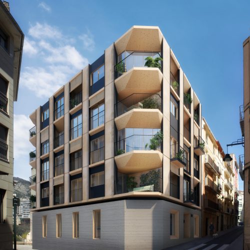 Volumen en esquina con estructura en madera y basamento mineral diseñado por estudio de arquitectura en Valencia