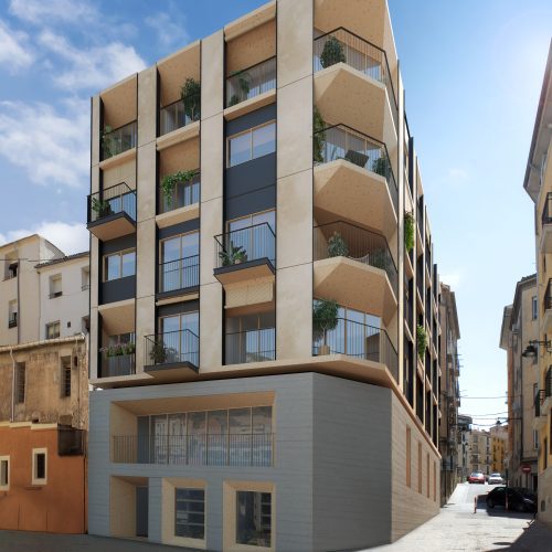 Vista urbana del edificio piloto con estructura CLT y basamento pétreo por arquitectos Valencia