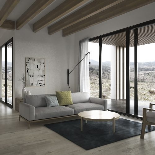 Interior de salón-comedor con estructura de madera vista en vivienda modular proyectada por arquitectos Valencia